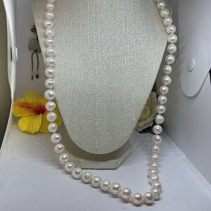 12mm cultured freshwater pearl necklace. Hand knotted without clasp. 30”